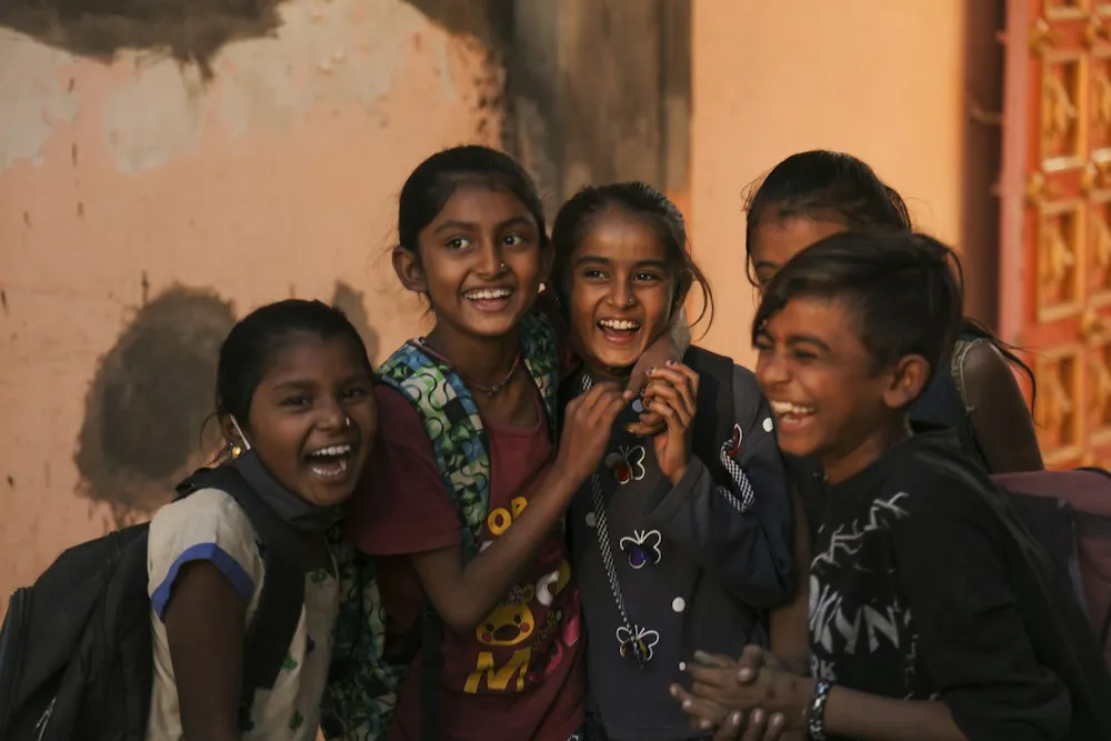A group of students laughing together
